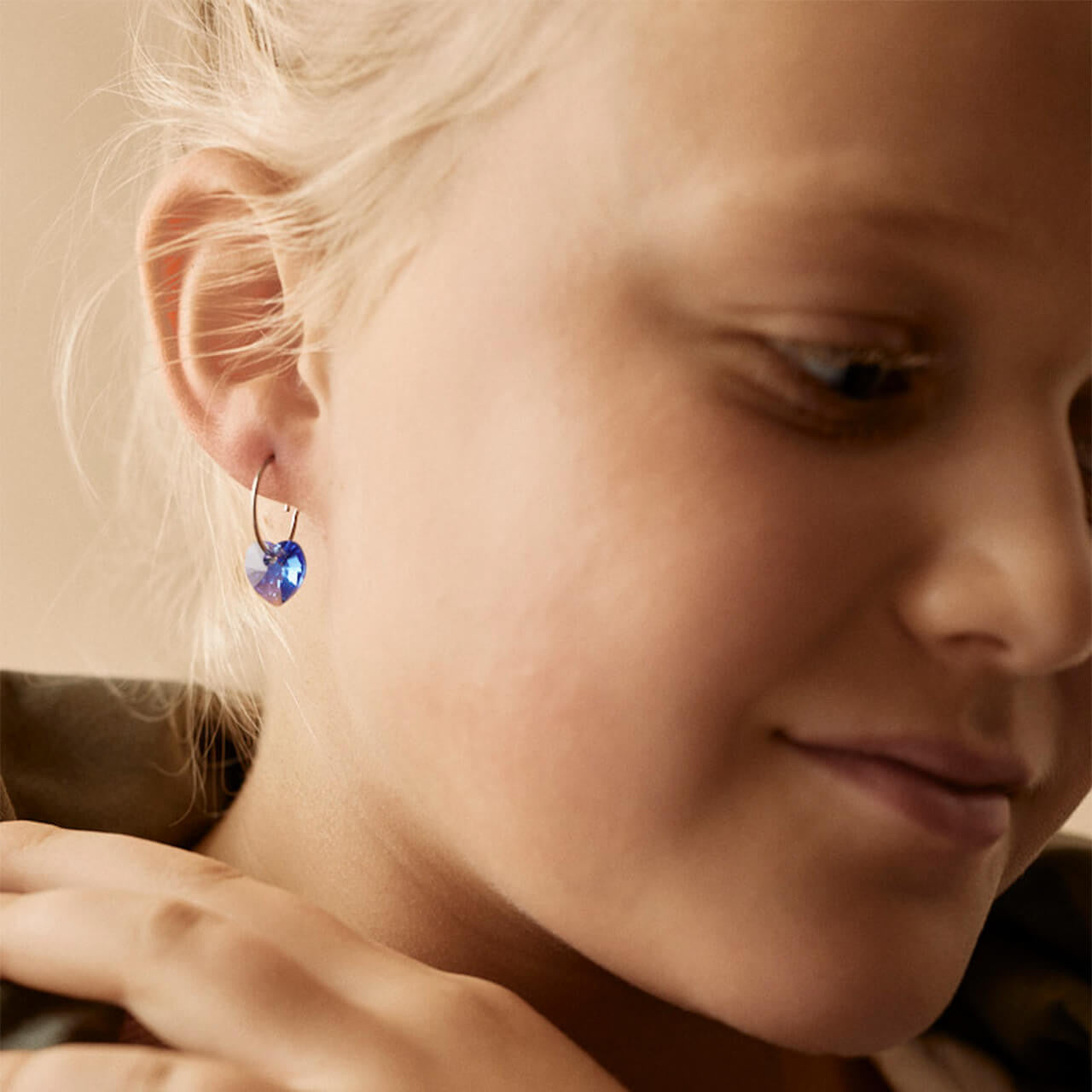 Heart Pendant Earring in Sapphire on model
