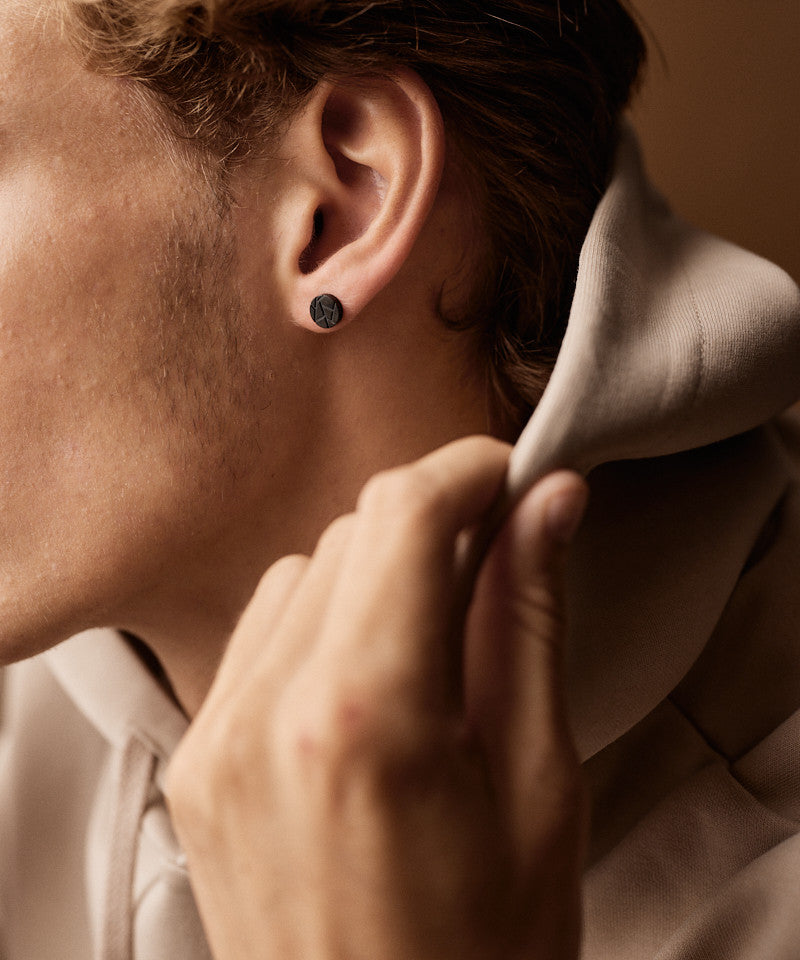 Model wearing the 8mm Black Titanium Paragon Earrings